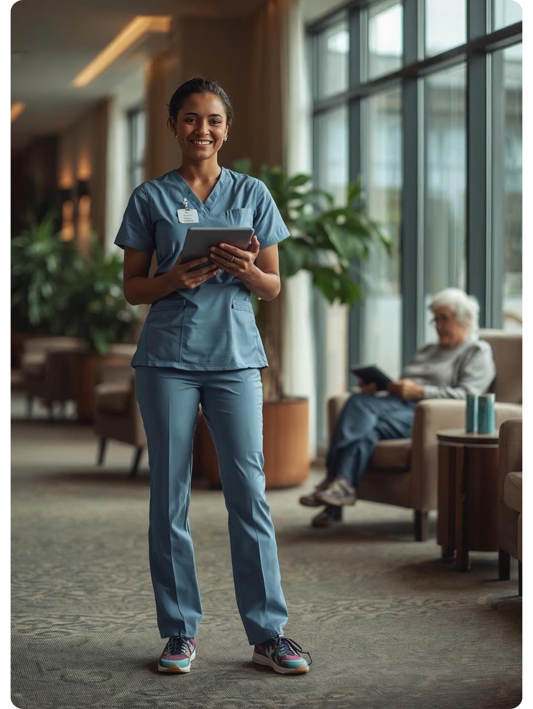 aged care worker in NSW nursing home holding tablet aged care worker in NSW nursing home holding tablet
